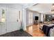 Bright entryway with tile flooring, leading to living room at 5513 N Peachtree Rd, Dunwoody, GA 30338