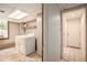 Convenient laundry room with washer, dryer, and extra storage at 5513 N Peachtree Rd, Dunwoody, GA 30338