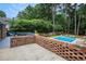 Brick patio overlooking a refreshing swimming pool at 5513 N Peachtree Rd, Dunwoody, GA 30338