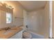 Bathroom with granite countertop and shower/tub combo at 100 Glace Rd, Atlanta, GA 30349