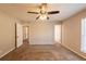 Spacious bedroom with ceiling fan and carpet at 100 Glace Rd, Atlanta, GA 30349