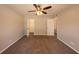 Large bedroom with ceiling fan and two entrances at 100 Glace Rd, Atlanta, GA 30349