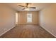 Bedroom with ceiling fan and neutral decor at 100 Glace Rd, Atlanta, GA 30349