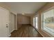 Bright dining area with hardwood floors and access to the kitchen at 100 Glace Rd, Atlanta, GA 30349