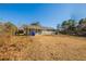 Updated ranch house exterior with a large backyard at 100 Glace Rd, Atlanta, GA 30349