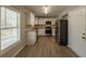 Updated kitchen featuring white cabinets and granite countertops at 100 Glace Rd, Atlanta, GA 30349