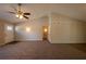 Open living room with hardwood floors and access to other rooms at 100 Glace Rd, Atlanta, GA 30349