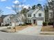 Two-story house with brick and siding, driveway, and landscaping at 4676 Ravenwood Loop, Union City, GA 30291