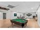 Finished basement with pool table, fireplace, and seating area at 3542 Linecrest Rd, Ellenwood, GA 30294