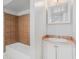 Bathroom with shower/tub combo, vanity, and mirror at 3542 Linecrest Rd, Ellenwood, GA 30294