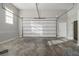 Bright garage with overhead door at 3542 Linecrest Rd, Ellenwood, GA 30294