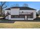 Rear view of house, showing deck and screened porch at 3542 Linecrest Rd, Ellenwood, GA 30294