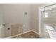 Small laundry room with garage access at 3542 Linecrest Rd, Ellenwood, GA 30294