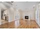 Bright living room with hardwood floors, fireplace and access to back deck at 3542 Linecrest Rd, Ellenwood, GA 30294