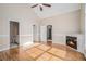 Main bedroom with hardwood floors, fireplace, and ensuite bathroom at 3542 Linecrest Rd, Ellenwood, GA 30294