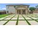 Large backyard with patio and grassy area at 6235 Stillwood Ln, Cumming, GA 30041