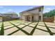 Large backyard with patio and grassy area at 6235 Stillwood Ln, Cumming, GA 30041