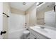 Clean bathroom with tub, toilet and vanity at 6235 Stillwood Ln, Cumming, GA 30041