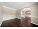 Bright dining room with hardwood floors and archways at 6235 Stillwood Ln, Cumming, GA 30041