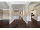 Grand entryway with high ceilings and dark hardwood floors at 6235 Stillwood Ln, Cumming, GA 30041