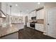 Kitchen with white cabinets, granite counters, and stainless steel appliances at 6235 Stillwood Ln, Cumming, GA 30041