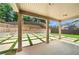 Covered patio with view of backyard at 6235 Stillwood Ln, Cumming, GA 30041