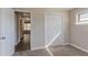 Well-lit bedroom with built-in closet and carpet at 2884 Santa Monica Dr, Decatur, GA 30032