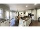 Open concept kitchen with large island, stainless steel appliances and breakfast area at 2968 Winterthur Close Nw, Kennesaw, GA 30144