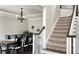 Two-story entryway with hardwood floors, staircase, and console table at 2968 Winterthur Close Nw, Kennesaw, GA 30144