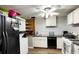 Basement kitchen with white cabinets and modern appliances at 2968 Winterthur Close Nw, Kennesaw, GA 30144