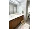Bathroom featuring a double vanity with a countertop and ample storage at 2968 Winterthur Close Nw, Kennesaw, GA 30144