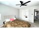 A simply designed bedroom with a queen bed and mirrored closet doors at 2968 Winterthur Close Nw, Kennesaw, GA 30144