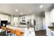 Spacious kitchen with granite countertops, island, and stainless steel appliances at 2968 Winterthur Close Nw, Kennesaw, GA 30144