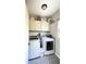 Hallway with access to garage, laundry, and pantry at 2968 Winterthur Close Nw, Kennesaw, GA 30144