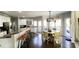 Modern kitchen with granite countertops, stainless steel appliances, and large island at 2968 Winterthur Close Nw, Kennesaw, GA 30144