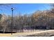 Outdoor recreational tennis courts at Legacy Park on a clear day at 2968 Winterthur Close Nw, Kennesaw, GA 30144