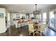 Large kitchen with white cabinets, granite countertops, and an island at 2968 Winterthur Close Nw, Kennesaw, GA 30144