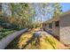 Landscaped backyard with patio and retaining wall at 3701 Glen Mora Dr, Decatur, GA 30032
