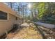 Backyard view with patio and retaining wall at 3701 Glen Mora Dr, Decatur, GA 30032
