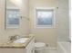 Clean bathroom with granite vanity and marble tile at 3701 Glen Mora Dr, Decatur, GA 30032