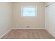 Spacious bedroom with neutral carpeting and ample closet space at 3701 Glen Mora Dr, Decatur, GA 30032