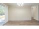 Dining area with wood-look floors and sliding glass doors at 3701 Glen Mora Dr, Decatur, GA 30032