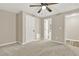 Spacious bedroom with plush carpeting and access to a private bathroom at 6218 Old Stilesboro Nw Rd, Acworth, GA 30101