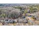 Aerial view of neighborhood homes nestled amongst lush greenery at 665 Ferris Sw St, Atlanta, GA 30310