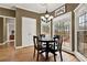 Breakfast nook boasts hardwood floors and deck access at 672 Red Sunset Cir, Powder Springs, GA 30127