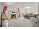 Living room with fireplace, carpet, and access to backyard at 1660 Cedar Bluff Way, Marietta, GA 30062