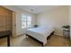 Cozy bedroom with a large window and closet at 3284 Long Iron Pl, Lawrenceville, GA 30044