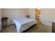 Bright bedroom with large bed and en-suite bathroom at 3284 Long Iron Pl, Lawrenceville, GA 30044