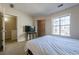 Spacious bedroom with large window and closet at 3284 Long Iron Pl, Lawrenceville, GA 30044