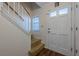 Entryway with staircase and neutral color palette at 3284 Long Iron Pl, Lawrenceville, GA 30044